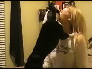 Blonde kissing dog