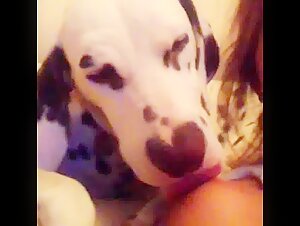 woman warms up with her dog